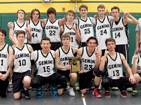 Glendale senior boys basketball team celebrates with the TVRA AA championship plaque Thursday after defeating College Avenue.  (CHRIS ABBOTT/TILLSONBURG NEWS)