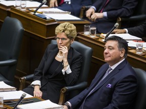 Ontario Premier Kathleen Wynne and Finance Minister Charles Sousa as the legislative session resumes after the winter break at Queen's Park in Toronto, Ont. on Tuesday February 21, 2017. (Ernest Doroszuk/Toronto Sun)