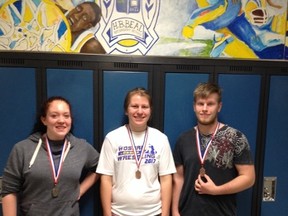 Arthur Voaden S.S. WOSSA wrestlers Brianna Thompson, left, Cadence MacLeod and Tyler Fox. The teens placed third, second place and third respectively. MacLeod qualified for OFSAA. Contributed Photo