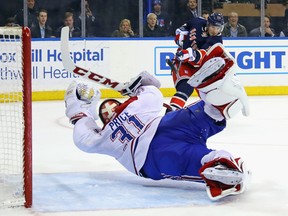 Carey Price #31 of the Montreal Canadiens makes the diving save in the closing seconds of overtime against J.T. Miller #10 of the New York Rangers at Madison Square Garden on February 21, 2017 in New York City. The Canadiens defeated the Rangers 3-2 in the shootout.  (Bruce Bennett/Getty Images)