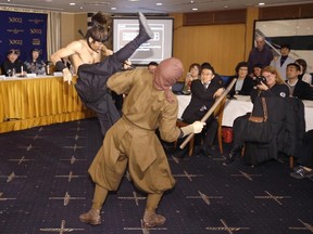 Members of Iga ninja group Ashura demonstrate a ninja-inspired martial-art during a press conference by the Japan Ninja Council at Foreign Correspondents' Club of Japan in Tokyo, Wednesday, Feb. 22, 2017. (Shizuo Kambayashi/AP Photo)