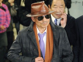 Satoru Nomura, leader of the Kudo-kai, is accused of hiring a hit on a nurse after a botched penis enlargement surgery.