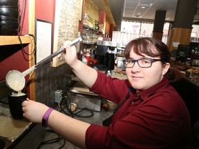 Jason Miller/The Intelligencer
Miranda Sheridan, of Sans Souci, is pictured here pouring some loaded potato soup during lunch hour, Wednesday, at the Front Street eatery that will be one of 14 participants cooking up sumptuous soups for this year's Savour the Chill & Stay Awhile event being held in the core Saturday.