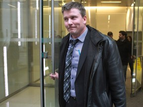 High school teacher Timothy C. Sullivan leaves a disciplinary hearing in Toronto, on Tuesday, February 21, 2017. An Ontario science teacher accused of telling his high school students they could die as a result of vaccination had a history of pushing anti-vaccine theories, the hearing heard Tuesday. (THE CANADIAN PRESS/Chris Young)