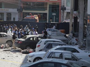 Police cordon off the area of explosion in Lahore, Pakistan, Thursday, Feb. 23, 2017. A Pakistani provincial minister says an explosion has killed at least eight people in the eastern city of Lahore. The violence is the latest in a string of brazen suicide bombings and other attacks over the past two weeks that have killed over 125 people. The attacks have been claimed by an array of militant groups, including the Islamic State group and a splinter Taliban faction, and have prompted a countrywide crackdown on militants. (AP Photo/K.M. Chaudary)