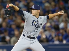 Jeff Beliveau of the Tampa Bay Rays pitches during a game against the Blue Jays at Rogers Centre in Toronto. (Tom Szczerbowski/Getty Images)