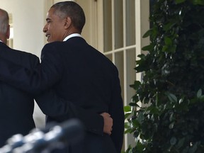 US President Barack Obama leave together with Vice President Joe Biden after adressing, for the first time publicly, the shock election of Donald Trump as his successor, on November 9, 2016 at the White House in Washnigton, D.C. (AFP PHOTO)