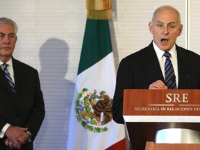 U.S. Homeland Security Secretary John Kelly (right), accompanied by Secretary of State Rex Tillerson, speaks at the Mexican Ministry of Foreign Affairs in Mexico City on Thursday, Feb. 23, 2017. (Carlos Barria/Pool Photo via AP)