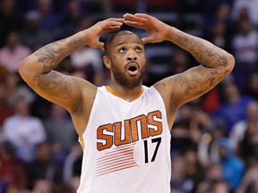 Phoenix Suns forward P.J. Tucker reacts to a call during the second half of the team's NBA game against the Los Angeles Clippers on Feb. 1, 2017. (AP Photo/Matt York)