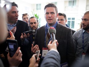 Reporters surround Richard Spencer during the first day of the Conservative Political Action Conference at the Gaylord National Resort and Convention Center Feb. 23, 2017 in National Harbor, Md.  (Photo by Chip Somodevilla/Getty Images)