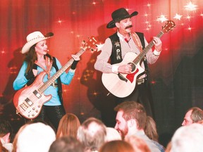 Richard and Deborah Popovich entertained the audience during the Cure for Cabin Fever event at the Arrowwood Hall Feb. 11. Jasmine O'Halloran Vulcan Advocate