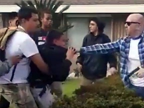 A  fight Tuesday between the off-duty Los Angeles police officer and the group of kids stemmed from ongoing issues with teens walking across the man’s property in Anaheim. (YouTube screen grab)