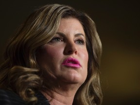 Interim Conservative Leader Rona Ambrose speaks about her private members bill in the Foyer of the House of Commons in Ottawa, Thursday February 23, 2017. (THE CANADIAN PRESS/Adrian Wyld)