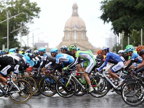 Racers make their way past the Alberta Legislature during the final stage of the Tour of Alberta in Edmonton on Sept. 7, 2014. (David Bloom)