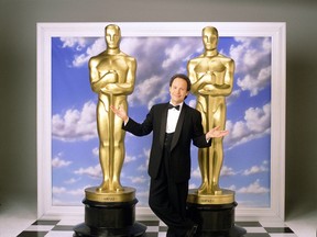 Billy Crystal hosted the 1997 Academy Awards. Crystal hosted four consecutive Oscar shows, beginning in 1990. He received widespread critical praise and three Emmy nominations for his performances in 1991, 1992 and 1993, and took home the Emmy in 1991. He also won Emmys in 1991 and 1992 for his writing of the Oscar show. (ABC photo)