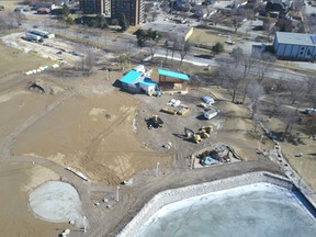 An aerial shot from a drone shows progress at Centennial Park, including work on the former Dow People Place, a concrete pad for play equipment, and a completed armour-stone wall. City officials are still projecting the park will fully reopen June 2. (Submitted)