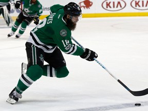 In this Feb. 11, 2017, file photo, Dallas Stars' Patrick Eaves skates up ice with the puck against the Carolina Hurricanes during an NHL hockey game in Dallas. (AP Photo/Mike Stone, File)