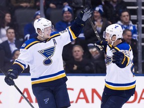 St. Louis Blues right wing Vladimir Tarasenko (91) celebrates his game-winning goal with defenceman Kevin Shattenkirk (22) after scoring against the Toronto Maple Leafs during the overtime period of an NHL game in Toronto on February 9, 2017.
