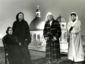 Dennis Curtis, third from left, as Scrooge, in this file photo from Dramatic Impact’s A Christmas Carol, which had a decade-long run at the Grand Theatre.
