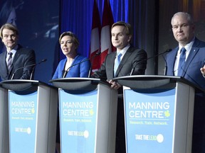 Chris Alexander, Kellie Leitch, Andrew Saxton and Erin O'Toole participate in a Conservative Party leadership debate at the Manning Centre conference, on Friday, Feb. 24, 2017 in Ottawa. (THE CANADIAN PRESS/Justin Tang)