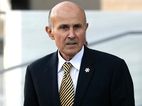 Former Los Angeles County Sheriff Lee Baca leaves federal court in Los Angeles. Baca went on trial on federal corruption charges Friday, Feb. 24, 2017, stripped of a ceremonial badge and unable to present a defense that might have won him sympathy if jurors knew he was in the early stage of Alzheimer's disease.