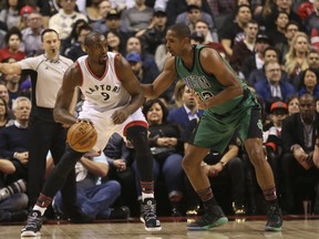 Toronto Raptors' Serge Ibaka is guarded by Boston Celtics' Al Horford during an NBA game in Toronto on Feb. 25, 2017. (Jack Boland/Toronto Sun/Postmedia Network)