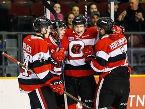 Ottawa 67’s Kody Clark (second from right) is congratulated by his teammates for one of his goals against the Oshawa Generals at TD Place last night. Ottawa won 3-2. (Errol McGihon/Ottawa sun)
