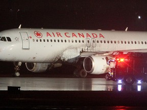 A Halifax Air Canada plane skids off the runway at Pearson International Airport on Saturday morning, just after midnight. (John Hanley)