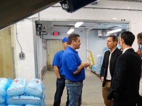 North Star Ice accounts manager Jeff Conway shows Ontario Progressive Conservative leader around the London plant. Brown was in London Saturday on a campaign-style stop to talk about soaring electricity rates. (JANE SIMS, The London Free Press)