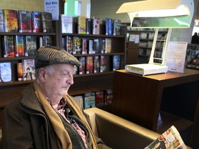 Paul Theberge uses a light therapy lamp at the Brentwood Toronto Public Library on Friday, February 17, 2017. (Veronica Henri/Toronto Sun)