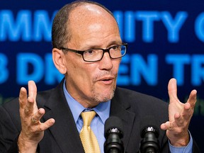 In this Sept. 29, 2014 file photo, then-Labor Secretary Tom Perez speaks in the South Court Auditorium in the White House compound in Washington.  (AP Photo/Manuel Balce Ceneta, File)