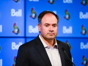 Senators general manager Pierre Dorion is working hard to add players to his roster before the NHL's trade deadline on March 1. (James Park/Postmedia/Files)