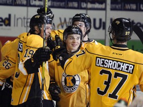 The Kingston Frontenacs celebrate after their first goal against the Hamilton Bulldogs courtesy of Ted Nichol just 12 seconds into the second period of Ontario Hockey League action at the Rogers K-Rock Centre in Kingston, Ont. on Sunday February 26, 2017. Steph Crosier/Kingston Whig-Standard/Postmedia Network