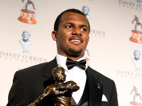 Deshaun Watson holds the National Quarterback Award trophy he received at the annual Davey O'Brien award ceremony in Fort Worth, Texas. (Joyce Marshall/Star-Telegram via AP)