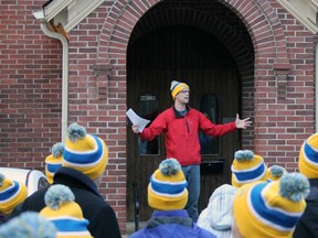 Adam Bloemendal, organizer and executive director of Nightlight, officially welcomes everyone to the Coldest Night of the Year fundraiser at Bethel Church on Johnson Street on Saturday. (Steph Crosier/The Whig-Standard)