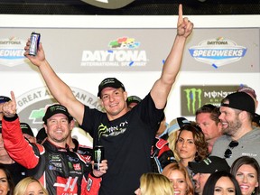 Kurt Busch, driver of the #41 Haas Automation/Monster Energy Ford, celebrates in Victory Lane with New England Patriots tight end Rob Gronkowski after winning the 59th Annual DAYTONA 500 at Daytona International Speedway on February 26, 2017 in Daytona Beach, Florida.  (Jared C. Tilton/Getty Images)