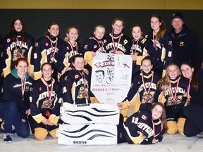 Members of the Mitchell Pee Wee girls celebrate their win in the recent Brantford tournament. SUBMITTED