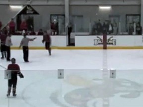 A still taken from video shows Brandon Day approaching a referee after bolting from the penalty box. (Video screengrab)