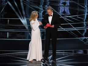 Actress Faye Dunaway and actor Warren Beatty announce the winner of the Best Movie category at the 89th Oscars on February 26, 2017 in Hollywood. (MARK RALSTON/AFP/Getty Images)