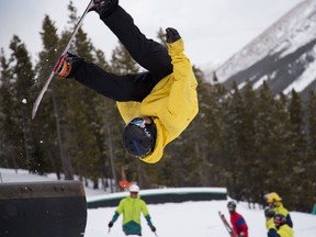 A handful of snowboarders and skiers of all skill levels shared their best tricks at the Jib in the Park on Feb. 19, for their chance to win sweet swag from event host and skate/snowboard shop Boarderline. | Justin Pitre photo/Contributed|@peachtreee_