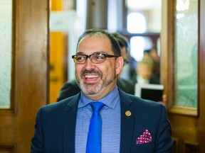 Ontario Energy Minister Glenn Thibeault smiles at the waiting media after a Legislative session Queen's Park in Toronto on Feb. 21, 2017. (Ernest Doroszuk/Toronto Sun/Postmedia Network)