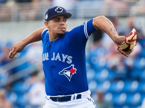 Toronto Blue Jays relief pitcher Roberto Osuna works against the Pittsburgh Pirates during spring training action in Dunedin on Feb. 27, 2017. (THE CANADIAN PRESS/Nathan Denette)