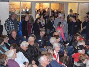 More than 200 people, many of them firefighters, packed the smallish Kinsmen Hall in Lively to hear a presentation on the city's plans to modernize its fire and ambulance services by axing aging stations and bolstering its career crew. Jim Moodie/The Sudbury Star