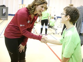 Catriona LeMay Doan, a member of the Canada Games bid evaluation committee, talks to Mateo Signoretti at Laurentian University in Sudbury, Ont. on Monday February 27, 2017. Students from area schools were on hand for a mini-summer games to welcome the Canada Games bid evaluation committee for Sudbury's bid for the 2021 Canada Summer Games. Gino Donato/Sudbury Star/Postmedia Network