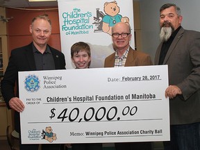 Moe Sabourin, President, WPA; Logan Quatember, Champion Child; Lawrence Prout, CEO, CHFM; George VanMackelbergh, Vice President, WPA after a donation of $40,000 was named to Children's Hospital.