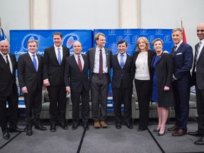 Conservative Party leadership candidates (from left to right) Kevin O'Leary, Andrew Saxton, Andrew Sheer, Rick Petterson, Chris Alexander, Michael Chong, Lisa Raitt, Kelie Leitch, Maxime Bernier and Steven Blaney stand for a photo prior to a debate in Montreal on Feb. 13, 2017. (Paul Chiasson/The Canadian Press)