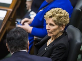 Ontario’s provincial government is forecasted to finally balance the book after nine consecutive deficits. But Premier Kathleen Wynne should not view that as evidence that it’s time to begin spending more freely. (TORONTO SUN/FILES)