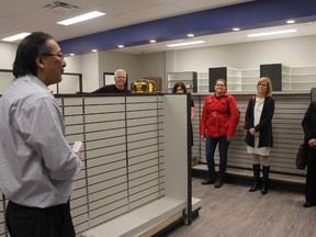 Dentist Derek Haruta, left, spent years developing the new Elmdale Health Centre that will be home to his practice and eight family doctors. St. Thomas Mayor Heather Jackson, third from right, and other community leaders toured the centre Friday, Feb. 24. (JONATHAN JUHA/POSTMEDIA NETWORK)