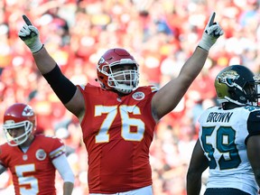 In this Nov. 6, 2016, file photo, Kansas City Chiefs offensive lineman Laurent Duvernay-Tardif celebrates during an NFL game against the Jacksonville Jaguars in Kansas City, Mo. (AP Photo/Ed Zurga, File)