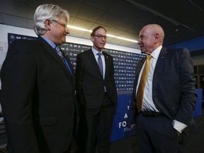 Toronto Argonauts owner Larry Tanenbaum with new coach Marc Trestman and GM Jim Popp in Toronto on Feb. 28, 2017. (Jack Boland/Toronto Sun/Postmedia Network)